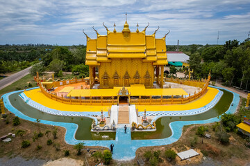 A top view from a drone of the temple building is shaped like a traditional Thai boat at Wat Tha...