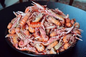 Platter of fresh cooked langostino in Brittany, France