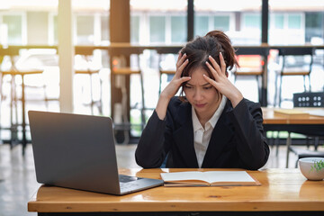 Burnout syndrome at work concept. exhausted overworked woman working in office.Concept Burnout Syndrome.