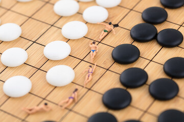 Swimming between pieces on a miniature creative chessboard