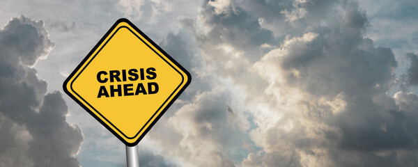 crisis ahead sign on white background