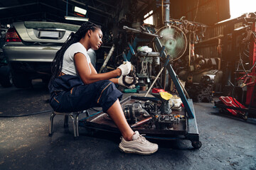 Obraz na płótnie Canvas Auto mechanic are repair mechanical part and maintenance auto engine is problems at car repair shop.