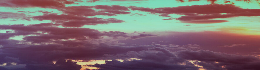 Panorama photo twilight sky background. Colorful Sunset sky and cloud. vivid sky in twilight time background. Orange sunset sky. Beautiful