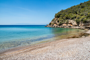 Fototapeta premium Rocky shore of mediterranean sea bay closeup in sunny summer day