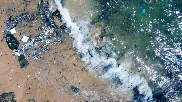Aerial view high angle view Video slow motion The sea is contaminated by human-caused waste. in island Phuket Thailand. Tropical sea Andaman sea Location Phuket Thailand. 