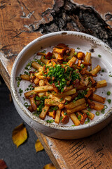 Fried potatoes with chanterelle mushrooms