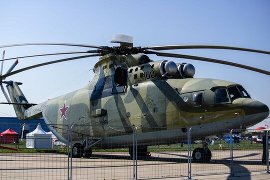 World's largest serial military transport helicopter Mi-26 (according to NATO codification: Halo) in static parking lot. MAKS-2011 Close-up. Green helicopter. Zhukovsky, Russia August 16, 2011