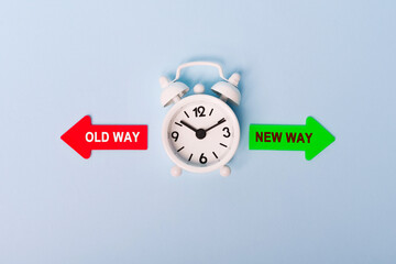 Red and green arrows - direction indicator - choice of old or new way. Concept of choice. Two...