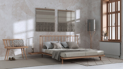 Japandi bedroom in white and beige tones with macrame wall art and wallpaper. Wooden furniture, carpets and double bed. Wabi sabi interior design