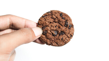 Holding a chocolate chips isolated white background