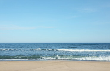 Picturesque view of beautiful sea and sandy beach on sunny day