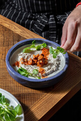 Hummus with chanterelle mushrooms