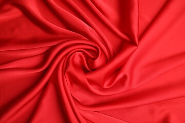 Texture of delicate red silk as background, top view