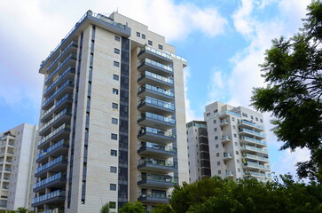 Beautiful residential building surrounded by a garden. Modern housing. Israel - high-rise building,...