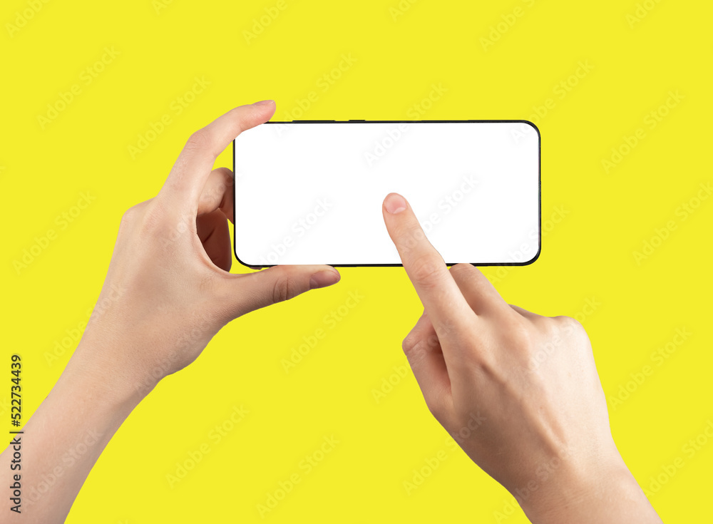 Aufkleber forefinger clicking play to start video at phone mockup on yellow background. woman holding smartpho