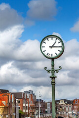 Fototapeta na wymiar Leiden, Netherlands town, street clock houses