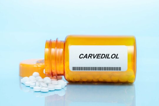 Carvedilol Drug In Prescription Medication  Pills Bottle