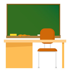 School green board with chalk and rulers and table in front and chair