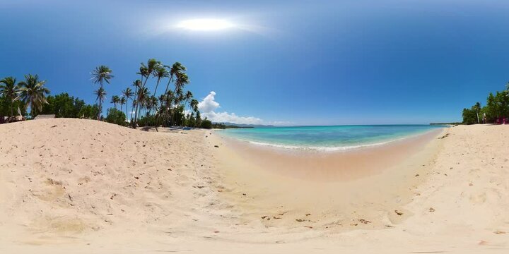 Seascape with tropical sandy beach and blue sea. Saud Beach, Pagudpud. Philippines. 360 Degree view.