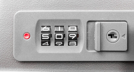Combination lock close-up. Numbers on the code lock. Code lock on suitcase.
