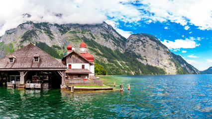 Mountain Watzmann and Pilgrimage church Sankt Bartholomä at Lake Koenigssee near Berchtesgaden Alps, Bavaria, Germany. East mountain range of the Watzmann massif in summer 