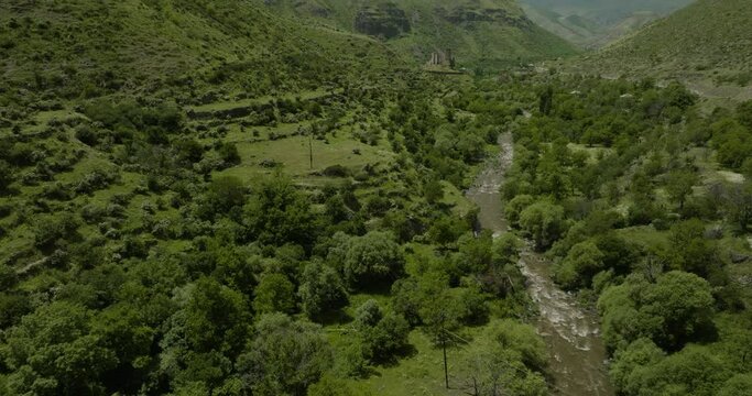 Paravani Estuary River Overlooking Khertvisi Fortress In Aspindza Municipality, Southern Georgia. Aerial Tilt-up Shot