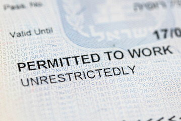 Israel working permit Visa B1 in passport for foreign workers. Legal Immigration to Israel concept. 
