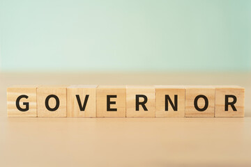 知事・長官・理事のイメージ｜「GOVERNOR」と書かれたブロック
