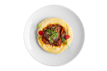 Mashed potatoes with sausages, mung bean salad, tomatoes and pork steak with red sauce