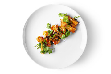 Fish in batter with parsley, leaf and onion