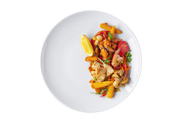 Salad with shrimps, corn, mussels, peppers, squid, tomatoes and parsley