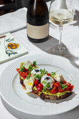 Bruschetta with tomatoes and poached egg