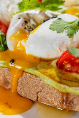 Bruschetta with tomatoes and poached egg