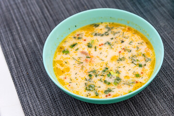 Karelian and Finnish national dish, traditional fish soup lohikeitto with salmon and cream.