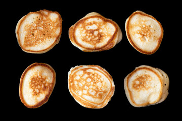 Pancakes different isolated objects on a black background