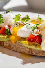 Bruschetta with tomatoes and poached egg