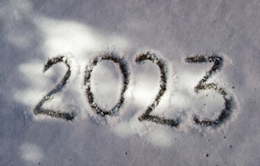 2023 new year written in snow