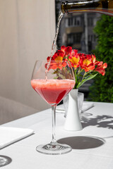 Cocktail with prosecco and strawberries