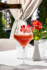 Cocktail with prosecco and strawberries