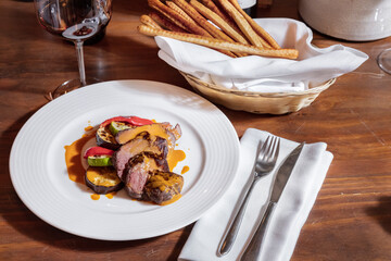 Meat with pepper, zucchini and sauce