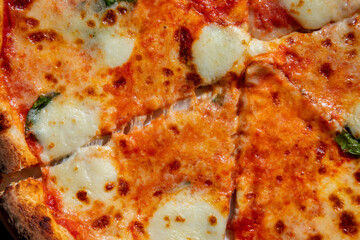 Pizza with different types of cheese