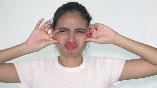 Diverse Woman Making Funny Faces Isolated