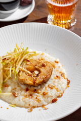 Porridge with sweet potatoes, apple and hazelnuts