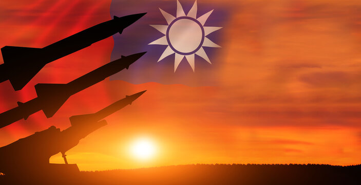 Silhouette of missiles in sunset background . Taiwan . Flag