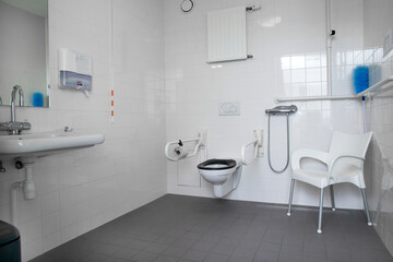 Fototapeta na wymiar Toilet. Bathroom. Elderly care. Care home. Apartment. Netherlands. Toilet for disabled people. Adapted toilet.