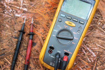 An electrical multimeter or voltmeter which is used to measuring the electricity value, it placed...