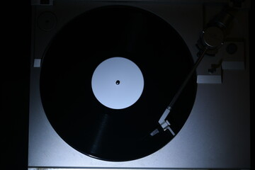 turntable in dramatic lighting