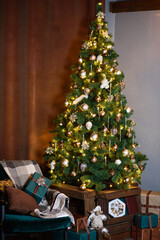 Interior with Christmas Tree with Brown and Gold Toys. Emerald chair with gifts near Christmas Tree