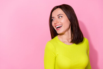 Photo of cheerful satisfied person toothy smile laughing look empty space isolated on pink color background