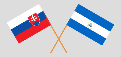 Crossed flags of Slovakia and Nicaragua. Official colors. Correct proportion